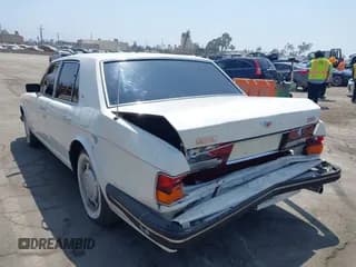 ✅ 1990 Bentley Turbo R • VIN: SCBZR03DXLCX32699 • Lot: 42960582. Wystawiony na IAAI z przebiegiem 38 147 mil. Bezpłatny archiwum sprzedaży aukcyjnych z USA i szczegółowy raport historii pojazdu na DreamBid. Zdjęcie 3.