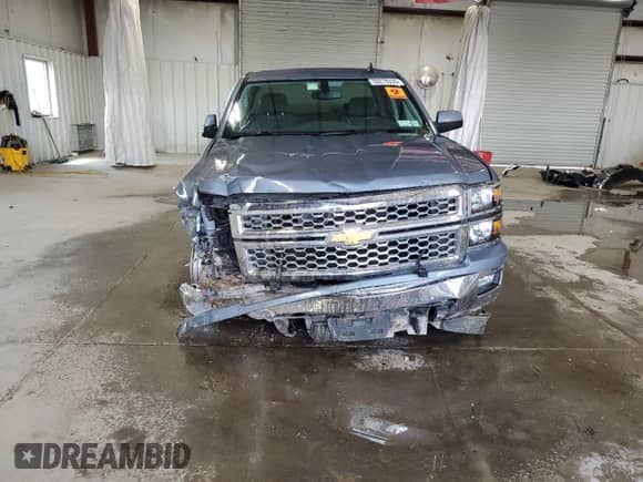 2015 Chevrolet Silverado 1500 LT z VIN 1GCVKRECXFZ429352, wystawiony jako Copart lot #59278335 z przebiegiem 69 532 mil mil oraz Szkoda całkowita • Salvage title. Historia ofert i sprzedaży dostępna na DreamBid. Obrazek 5.