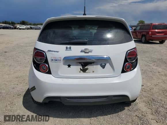 2013 Chevrolet Sonic RS z VIN 1G1JG6SB4D4252939, wystawiony jako Copart lot #66403215 z przebiegiem 168 896 mil mil oraz Szkoda całkowita • Salvage title. Historia ofert i sprzedaży dostępna na DreamBid. Obrazek 6.