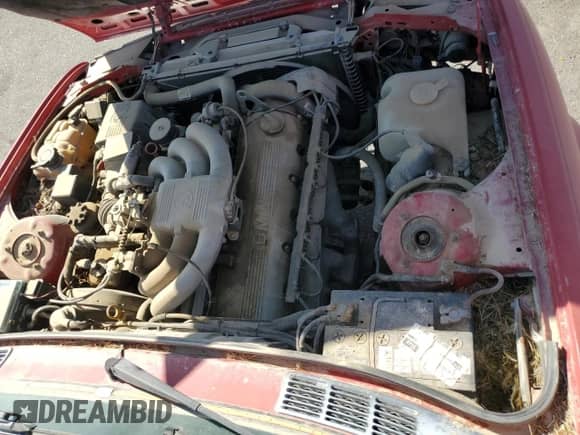 1990 BMW 3 Series z VIN WBABB2300LEC19669, wystawiony jako Copart lot #52403685 z przebiegiem 170 809 mil mil oraz Czysty tytuł • Clean title. Historia ofert i sprzedaży dostępna na DreamBid. Obrazek 11.