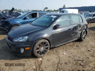 ✅ 2012 Volkswagen Golf GTI Autobahn • VIN: WVWHV7AJ2CW297911 • Lot: 66158175. Listed on Copart with 190,669 mi. Free auction sales archive from the USA and detailed vehicle history report at DreamBid. Image 1.