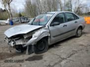 ✅ 2004 Ford Focus LX • VIN: 1FAFP33PX4W132594 • Lot: 65552465. Listed on Copart with 241,041 mi. Free auction sales archive from the USA and detailed vehicle history report at DreamBid. Image 1.