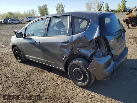 ✅ 2013 Honda Fit • VIN: LUCGE8H3XD3004182 • Лот: 84290895. Опубликован ранее на Copart с пробегом 157 415 миль. Бесплатный доступ к архиву аукционных продаж из США и подробный отчёт об истории автомобиля на DreamBid. Изображение 2.
