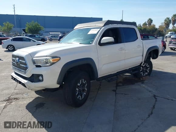 ✅ 2016 Toyota Tacoma SR5 • VIN: 3TMAZ5CN0GM021646 • Lot: 43562002. Listed on IAAI with 77,933 mi. Free auction sales archive from the USA and detailed vehicle history report at DreamBid. Image 18.