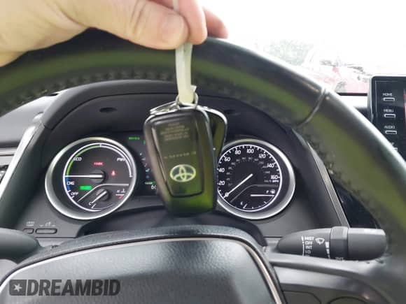 2022 Toyota Camry Hybrid XLE with VIN 4T1F31AK4NU591517, listed as a IAAI auction lot 42216959 with 36,048 mi miles and . Bid and sale history available at DreamBid. Image 11.