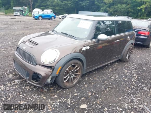 ✅ 2009 MINI Clubman S • VIN: WMWMM33569TP89990 • Lot: 42869350. Listed on IAAI with 94,090 mi. Free auction sales archive from the USA and detailed vehicle history report at DreamBid. Image 2.