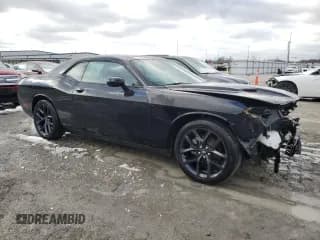 ✅ 2022 Dodge Challenger SXT • VIN: 2C3CDZAGXNH100597 • Lot: 38366253. Wystawiony na Copart z przebiegiem 5 519 mil. Bezpłatny archiwum sprzedaży aukcyjnych z USA i szczegółowy raport historii pojazdu na DreamBid. Zdjęcie 4.