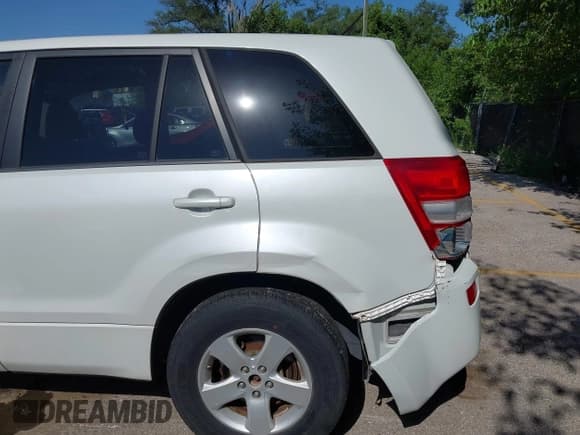 ✅ 2012 Suzuki Grand Vitara Premium • VIN: JS3TE0D67C4100186 • Lot: 42862856. Listed on IAAI with 133,573 mi. Free auction sales archive from the USA and detailed vehicle history report at DreamBid. Image 12.