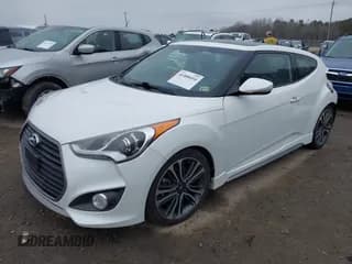 ✅ 2016 Hyundai Veloster Turbo Rally Edition • VIN: KMHTC6AE1GU272587 • Lot: 41408454. Wystawiony na IAAI z przebiegiem 65 270 mil. Bezpłatny archiwum sprzedaży aukcyjnych z USA i szczegółowy raport historii pojazdu na DreamBid. Zdjęcie 2.