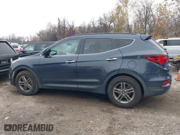✅ 2017 Hyundai Santa Fe 2.4L • VIN: 5NMZUDLBXHH034863 • Lot: 43744417. Listed on IAAI with 120,739 mi. Free auction sales archive from the USA and detailed vehicle history report at DreamBid. Image 14.
