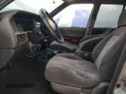 ✅ 1998 Jeep Grand Cherokee Laredo • VIN: 1J4GZ48S8WC313204 • Lot: 93124765. Listed on Copart with Not provided. Free auction sales archive from the USA and detailed vehicle history report at DreamBid. Image 7.