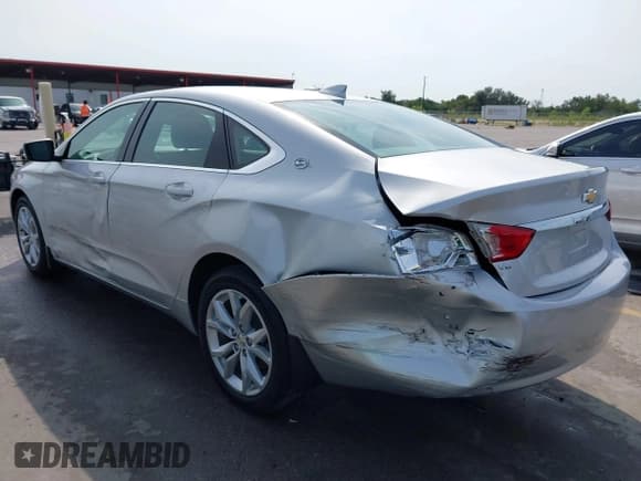 ✅ 2015 Chevrolet Impala LT • VIN: 2G1125S39F9297599 • Lot: 43159187. Listed on IAAI with 60,151 mi. Free auction sales archive from the USA and detailed vehicle history report at DreamBid. Image 3.