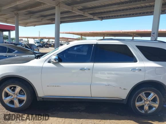 ✅ 2013 Dodge Durango Citadel • VIN: 1C4SDHET0DC690982 • Lot: 43392470. Listed on IAAI with 210,656 mi. Free auction sales archive from the USA and detailed vehicle history report at DreamBid. Image 13.