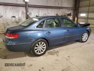 2009 Hyundai Azera GLS z VIN KMHFC46D89A349297, wystawiony jako Copart lot #85777694 z przebiegiem 103 647 mil mil oraz Szkoda całkowita • Salvage title. Historia ofert i sprzedaży dostępna na DreamBid. Obrazek 3.