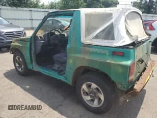 ✅ 1994 Geo Tracker • VIN: 2CNBE18U4R6933505 • Lot: 68421924. Wystawiony na Copart z przebiegiem 203 558 mil. Bezpłatny archiwum sprzedaży aukcyjnych z USA i szczegółowy raport historii pojazdu na DreamBid. Zdjęcie 2.