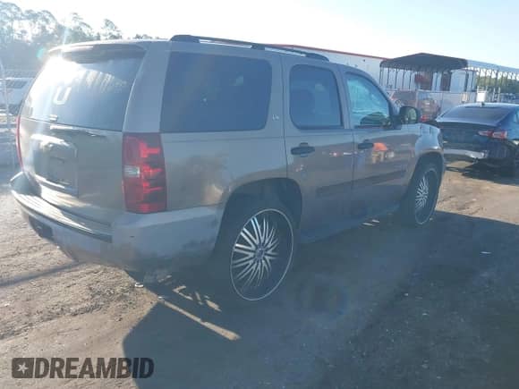 2007 Chevrolet Tahoe LTZ with VIN 1GNFC13037R236576, listed as a IAAI auction lot 43115213 with Not provided miles and . Bid and sale history available at DreamBid. Image 4.