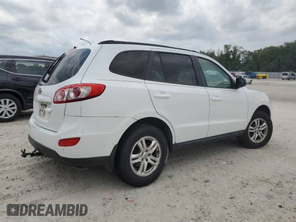 2012 Hyundai Santa Fe GLS с VIN 5XYZG3AB6CG157258, выставлен на аукционе Copart как лот 54052354 с пробегом 223 325 миль миль и На запчасти • Non repairable. История ставок и продаж доступна на DreamBid. Изображение 3.