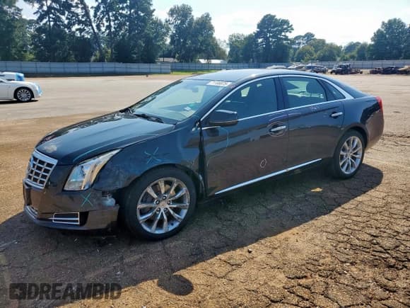 ✅ 2015 Cadillac XTS Luxury • VIN: 2G61M5S30F9200424 • Lot: 71106975. Listed on Copart with 122,427 mi. Free auction sales archive from the USA and detailed vehicle history report at DreamBid. Image 1.