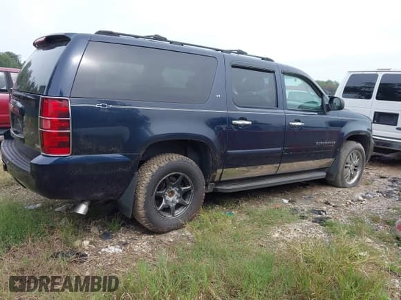✅ 2007 Chevrolet Suburban LT • VIN: 1GNFK16367J212232 • Lot: 43274931. Listed on IAAI with 214,704 mi. Free auction sales archive from the USA and detailed vehicle history report at DreamBid. Image 4.