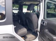 ✅ 2023 Jeep Wrangler Sport S • VIN: 1C4HJXDN2PW615882 • Lot: 42791138. Listed on IAAI with 21,993 mi. Free auction sales archive from the USA and detailed vehicle history report at DreamBid. Image 8.