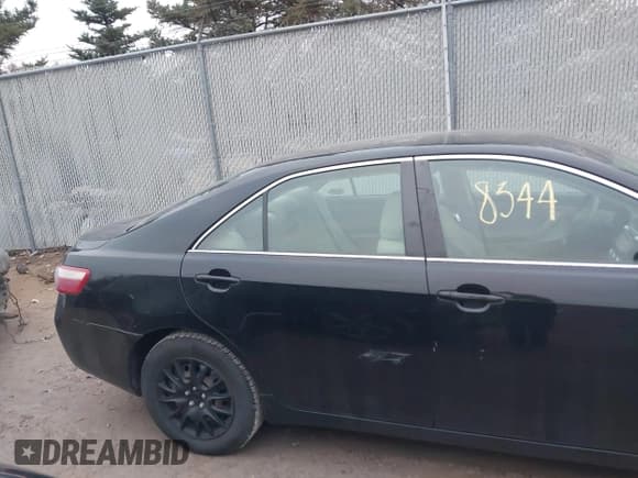 ✅ 2009 Toyota Camry LE • VIN: 4T1BE46K59U898915 • Lot: 43728344. Listed on IAAI with 297,888 mi. Free auction sales archive from the USA and detailed vehicle history report at DreamBid. Image 13.