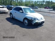 ✅ 2015 Volkswagen Beetle Fleet Edition • VIN: 3VWF17AT0FM655321 • Lot: 42386548. Listed on IAAI with 120,215 mi. Free auction sales archive from the USA and detailed vehicle history report at DreamBid. Image 1.