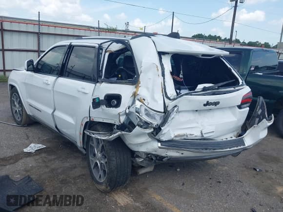 ✅ 2018 Jeep Grand Cherokee Limited • VIN: 1C4RJEBG2JC125920 • Lot: 42736605. Listed on IAAI with 100,597 mi. Free auction sales archive from the USA and detailed vehicle history report at DreamBid. Image 3.