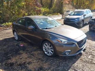 ✅ 2014 Mazda 3 S Touring • VIN: JM1BM1V35E1152668 • Lot: 43613645. Listed on IAAI with 90,509 mi. Free auction sales archive from the USA and detailed vehicle history report at DreamBid. Image 1.