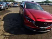 ✅ 2021 Mazda CX-30 Premium • VIN: 3MVDMBDY2MM265585 • Lot: 56051584. Wystawiony na Copart z przebiegiem 20 156 mil. Bezpłatny archiwum sprzedaży aukcyjnych z USA i szczegółowy raport historii pojazdu na DreamBid. Zdjęcie 11.
