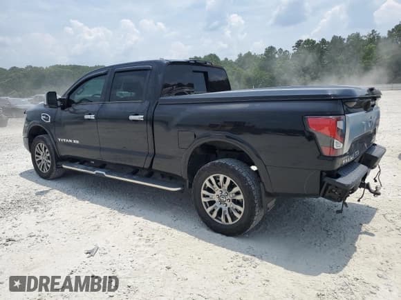 ✅ 2021 Nissan Titan Pro-4X • VIN: 1N6AA1FB8MN531727 • Lot: 62102265. Listed on Copart with 26,668 mi. Free auction sales archive from the USA and detailed vehicle history report at DreamBid. Image 2.