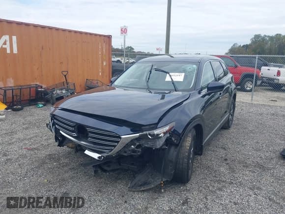 ✅ 2021 Mazda CX-9 Touring • VIN: JM3TCBCYXM0521709 • Lot: 43452547. Listed on IAAI with 50,115 mi. Free auction sales archive from the USA and detailed vehicle history report at DreamBid. Image 2.