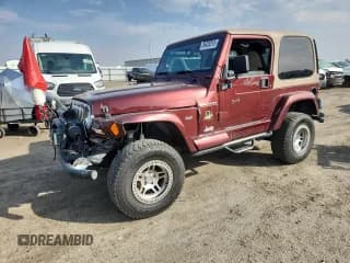 ✅ 2002 Jeep Wrangler Sahara • VIN: 1J4FA59S62P706936 • Lot: 86420315. Listed on Copart with 117,025 mi. Free auction sales archive from the USA and detailed vehicle history report at DreamBid. Image 1.