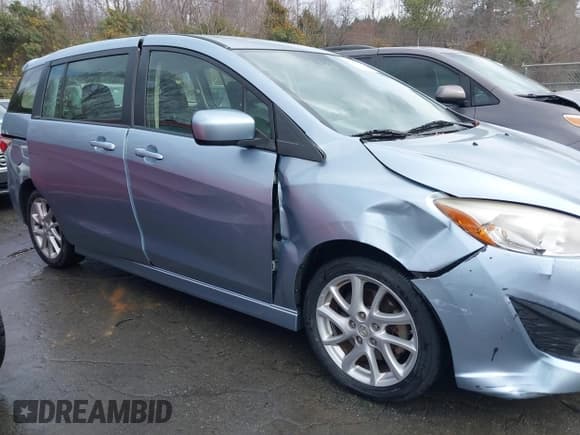 ✅ 2012 Mazda 5 Grand Touring • VIN: JM1CW2DL9C0130844 • Lot: 43792325. Listed on IAAI with 187,167 mi. Free auction sales archive from the USA and detailed vehicle history report at DreamBid. Image 13.
