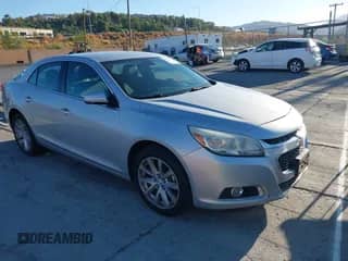 2014 Chevrolet Malibu LT z VIN 1G11E5SL9EF297650, wystawiony jako IAAI lot #43390723 z przebiegiem 297 680 mil mil oraz . Historia ofert i sprzedaży dostępna na DreamBid. Obrazek 1.