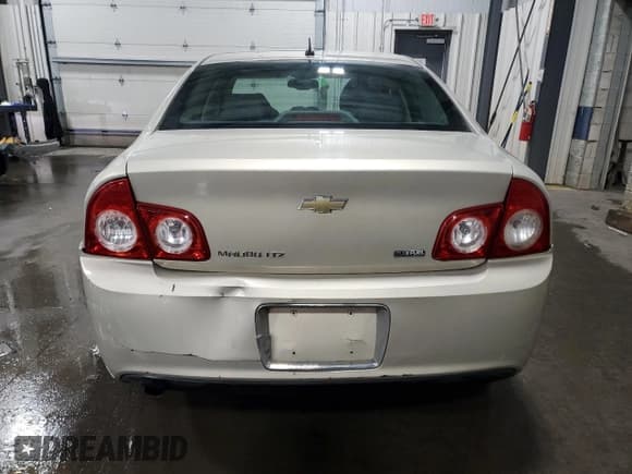 ✅ 2010 Chevrolet Malibu LTZ • VIN: 1G1ZE5E00AF131614 • Lot: 79124684. Listed on Copart with 252,614 mi. Free auction sales archive from the USA and detailed vehicle history report at DreamBid. Image 6.