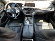 ✅ 2022 BMW 7 Series 740i • VIN: WBA7T2C05NCJ43929 • Лот: 69143305. Опубликован ранее на Copart с пробегом 28 559 миль. Бесплатный доступ к архиву аукционных продаж из США и подробный отчёт об истории автомобиля на DreamBid. Изображение 8.