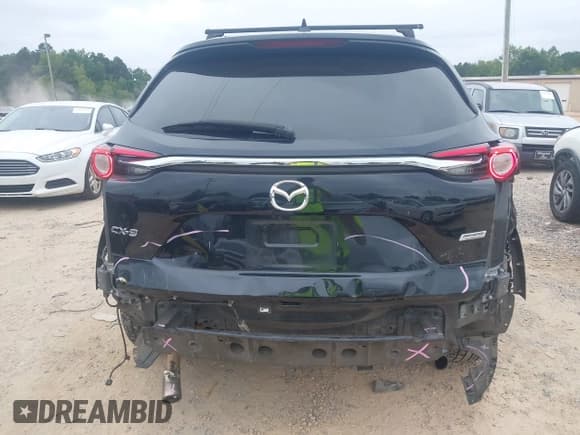 ✅ 2018 Mazda CX-9 Grand Touring • VIN: JM3TCADY9J0229571 • Lot: 43011548. Listed on IAAI with 147,896 mi. Free auction sales archive from the USA and detailed vehicle history report at DreamBid. Image 16.