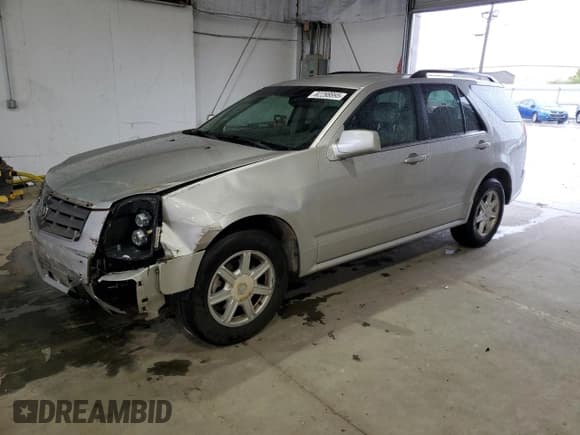 ✅ 2004 Cadillac SRX • VIN: 1GYDE637440141409 • Lot: 82288895. Listed on Copart with 217,209 mi. Free auction sales archive from the USA and detailed vehicle history report at DreamBid. Image 1.