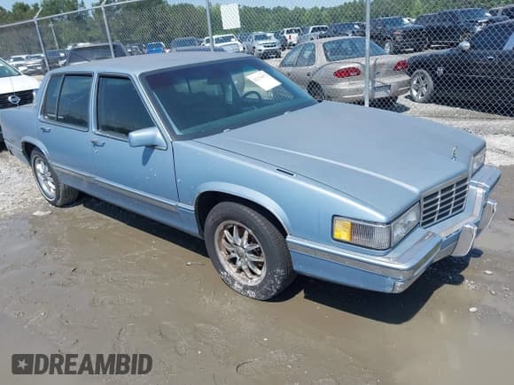 ✅ 1992 Cadillac DeVille • VIN: 1G6CD53B0N4286396 • Lot: 42278473. Listed on IAAI with 94,186 mi. Free auction sales archive from the USA and detailed vehicle history report at DreamBid. Image 1.