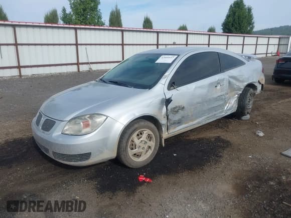 ✅ 2007 Pontiac G5 • VIN: 1G2AL15F277230885 • Лот: 42899937. Опубликован ранее на IAAI с пробегом 152 044 миль. Бесплатный доступ к архиву аукционных продаж из США и подробный отчёт об истории автомобиля на DreamBid. Изображение 2.
