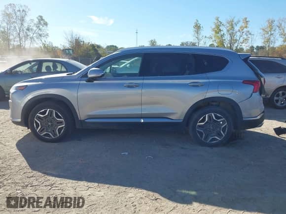 2023 Hyundai Santa Fe Limited with VIN 5NMS44AL4PH560563, listed as a IAAI auction lot 43364626 with 50,987 mi miles and . Bid and sale history available at DreamBid. Image 14.