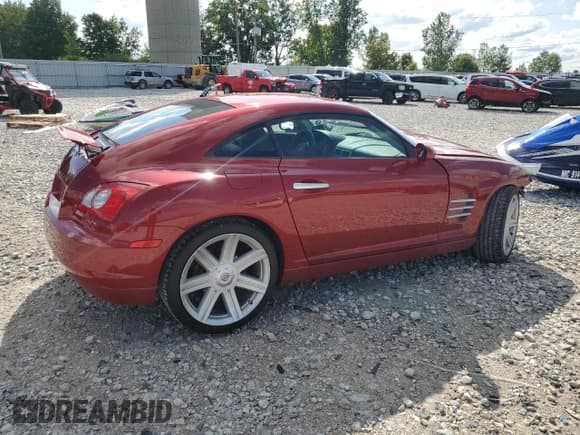 ✅ 2004 Chrysler Crossfire • VIN: 1C3AN69L84X019645 • Lot: 70467375. Listed on Copart with 64,996 mi. Free auction sales archive from the USA and detailed vehicle history report at DreamBid. Image 3.