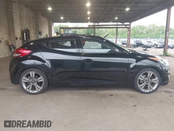 ✅ 2012 Hyundai Veloster w/Gray Int • VIN: KMHTC6AD8CU023947 • Lot: 42314126. Listed on IAAI with 57,630 mi. Free auction sales archive from the USA and detailed vehicle history report at DreamBid. Image 13.
