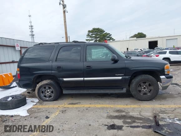 ✅ 2004 GMC Yukon SLT • VIN: 1GKEC13Z94J155468 • Lot: 41379947. Listed on IAAI with 309,815 mi. Free auction sales archive from the USA and detailed vehicle history report at DreamBid. Image 13.