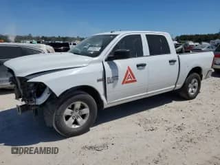 2022 Ram 1500 Tradesman with VIN 3C6RR6KT6NG275499, listed as a Copart auction lot 74212404 with 21,079 mi miles and Salvage title. Bid and sale history available at DreamBid. Image 1.