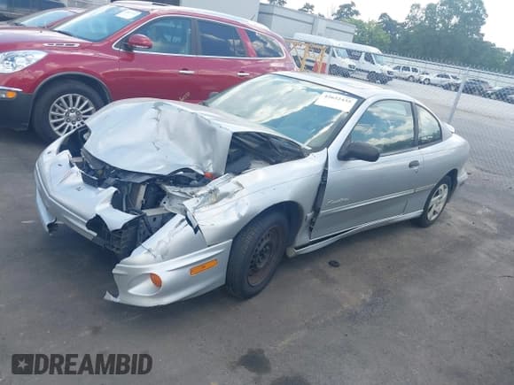 ✅ 2002 Pontiac Sunfire SE • VIN: 1G2JB124927244300 • Lot: 42652435. Listed on IAAI with Not provided. Free auction sales archive from the USA and detailed vehicle history report at DreamBid. Image 2.
