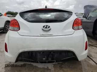 ✅ 2012 Hyundai Veloster w/Red Int • VIN: KMHTC6AD4CU055889 • Lot: 62264394. Listed on Copart with 138,504 mi. Free auction sales archive from the USA and detailed vehicle history report at DreamBid. Image 6.