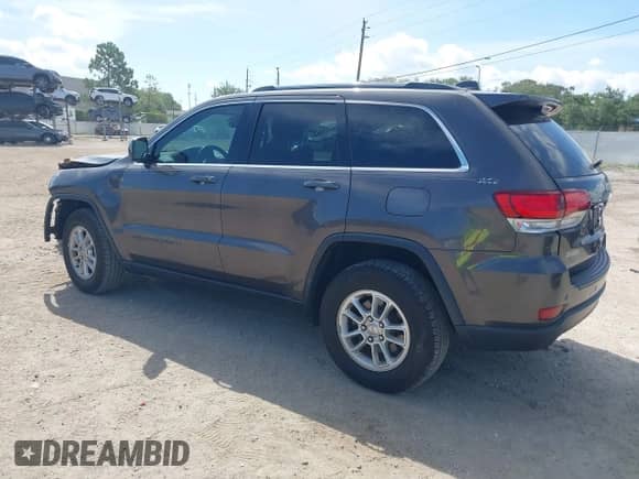 2020 Jeep Grand Cherokee Altitude z VIN 1C4RJEAG1LC245566, wystawiony jako IAAI lot #42699269 z przebiegiem 130 271 mil mil oraz . Historia ofert i sprzedaży dostępna na DreamBid. Obrazek 3.