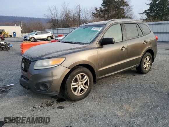 ✅ 2012 Hyundai Santa Fe GLS • VIN: 5XYZG4AG3CG135171 • Lot: 86797074. Listed on Copart with 191,222 mi. Free auction sales archive from the USA and detailed vehicle history report at DreamBid. Image 1.