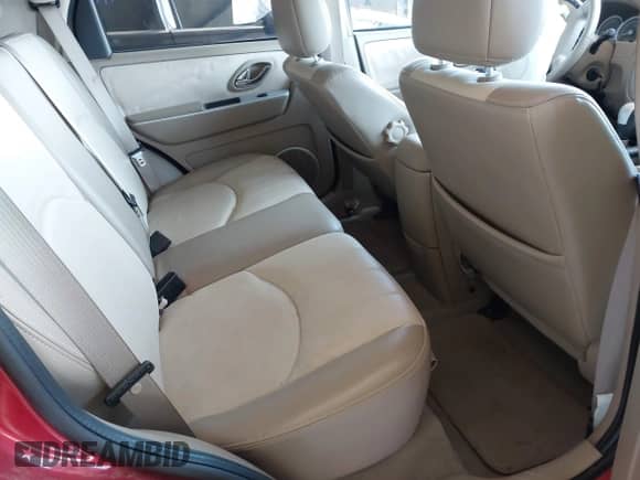 2006 Mercury Mariner Luxury z VIN 4M2YU56186KJ03260, wystawiony jako IAAI lot #42010188 z przebiegiem 103 673 mil mil oraz . Historia ofert i sprzedaży dostępna na DreamBid. Obrazek 8.